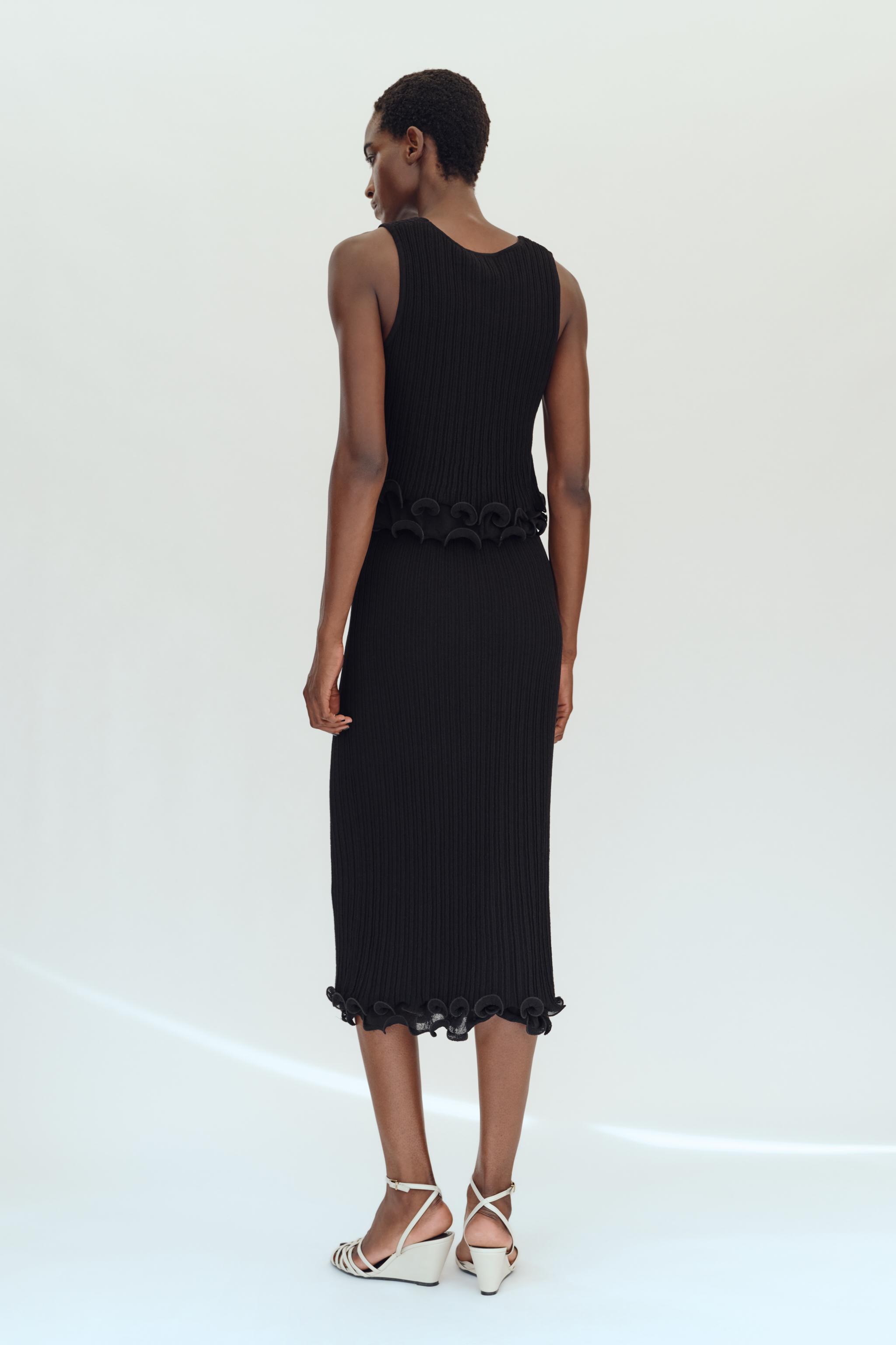 DOUBLE-LAYER KNIT MIDI SKIRT